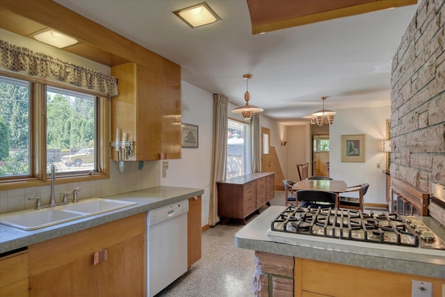 3303 W 8th Ave, Spokane, WA 99224 - kitchen featuring dishwasher, backsplash, and hanging light fixtures