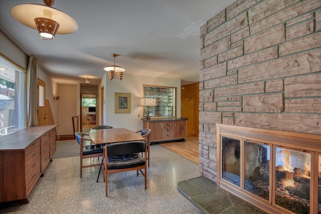 3303 W 8th Ave, Spokane, WA 99224 - dining space featuring a stone fireplace