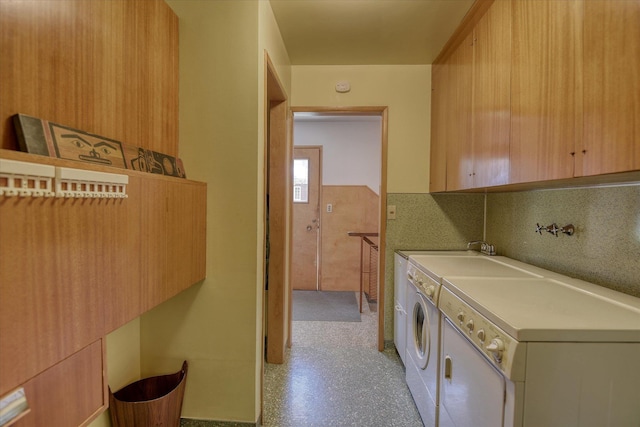 3303 W 8th Ave, Spokane, WA 99224 - washroom featuring cabinet space and washing machine and dryer
