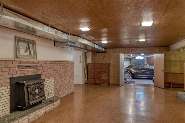 3303 W 8th Ave, Spokane, WA 99224 - unfurnished living room featuring a wood stove