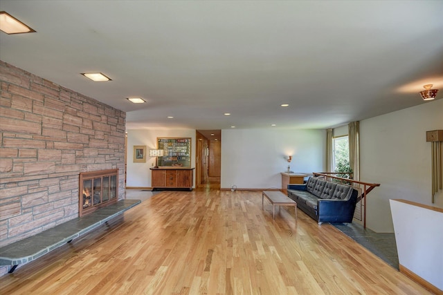 3303 W 8th Ave, Spokane, WA 99224 - living room with wood finished floors, a fireplace, and recessed lighting