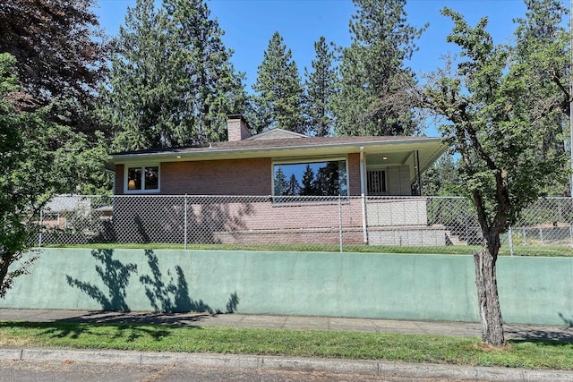 3303 W 8th Ave, Spokane, WA 99224 - view of front of house with brick siding and a chimney