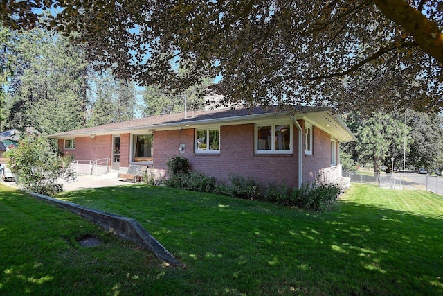 3303 W 8th Ave, Spokane, WA 99224 - back of property featuring brick siding and a patio area