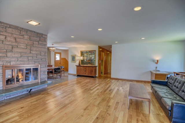 3303 W 8th Ave, Spokane, WA 99224 - living area featuring wood finished floors, recessed lighting, and a fireplace