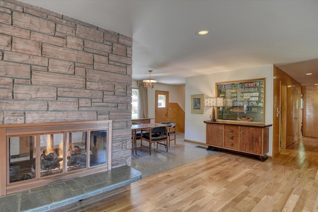 3303 W 8th Ave, Spokane, WA 99224 - living area with wood finished floors, a fireplace, and recessed lighting