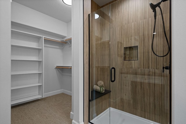 13306 N Starling Ln, Spokane, WA 99208 - full bathroom featuring a stall shower and a walk in closet