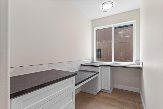 13306 N Starling Ln, Spokane, WA 99208 - walk in closet with light wood finished floors
