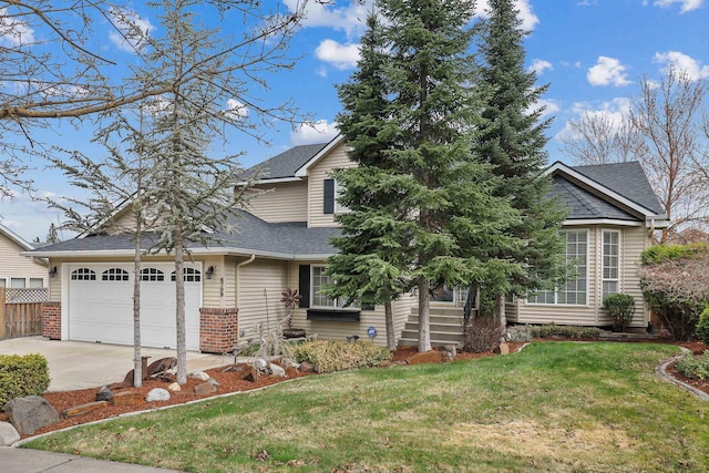 6709 S Moran View St, Spokane, WA 99224 - view of front of house featuring an attached garage, concrete driveway, roof with shingles, and brick siding