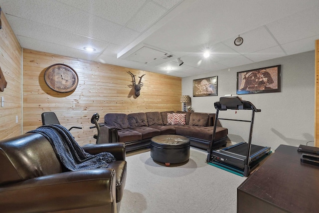 6709 S Moran View St, Spokane, WA 99224 - carpeted living area featuring wooden walls and a drop ceiling