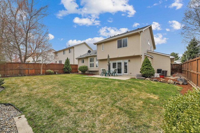 6709 S Moran View St, Spokane, WA 99224 - rear view of property featuring a patio and a fenced backyard