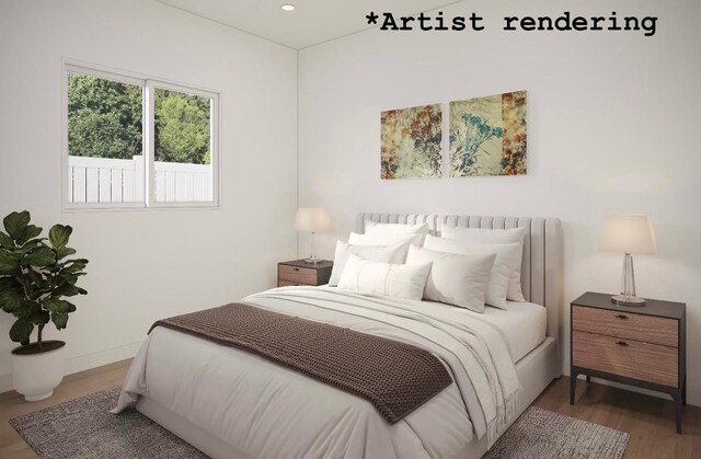 1324 W Dalke Ave Unit B, Spokane, WA 99205 - bedroom with wood finished floors and recessed lighting