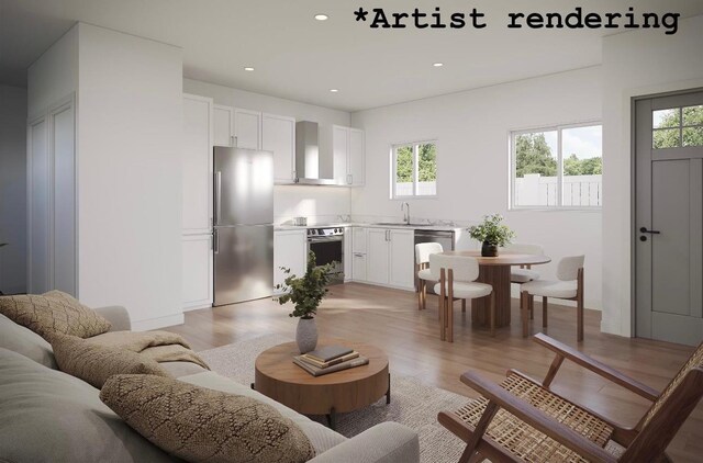 1324 W Dalke Ave Unit B, Spokane, WA 99205 - living area featuring healthy amount of natural light, light wood-style flooring, and recessed lighting