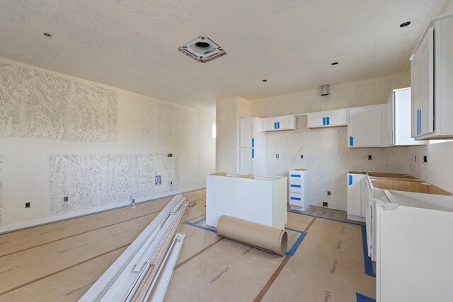 1324 W Dalke Ave Unit B, Spokane, WA 99205 - kitchen featuring white cabinets
