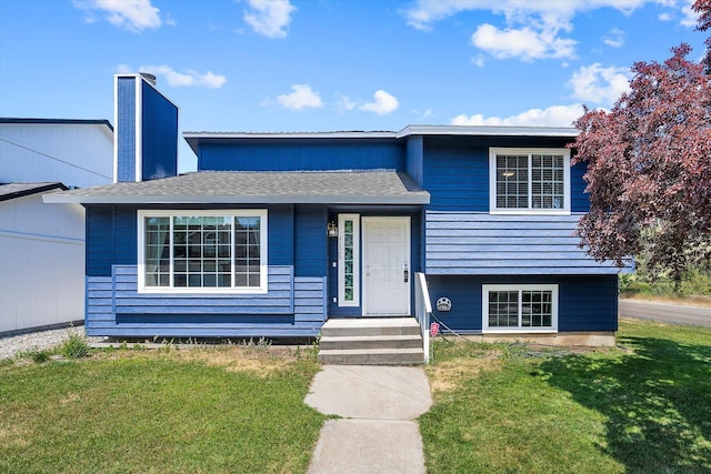 4129 E 32nd Ave, Spokane, WA 99223 - split level home featuring a front lawn