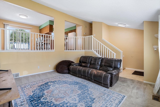 4129 E 32nd Ave, Spokane, WA 99223 - living area featuring carpet and stairway