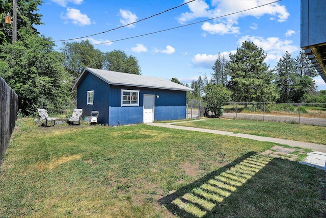 4129 E 32nd Ave, Spokane, WA 99223 - view of property exterior featuring a fenced backyard and an outbuilding