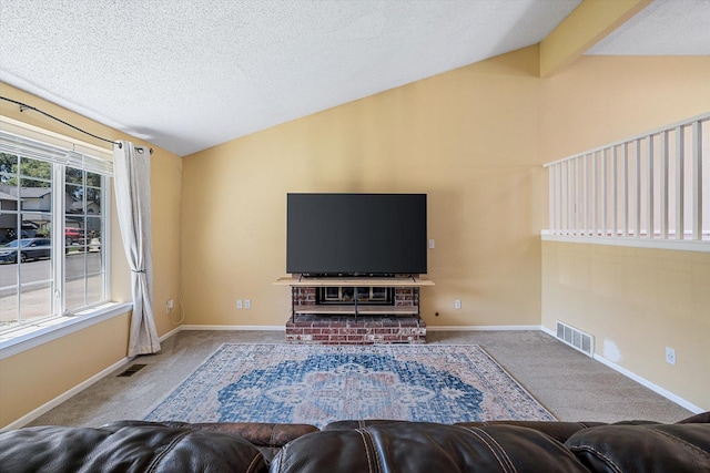4129 E 32nd Ave, Spokane, WA 99223 - carpeted living area featuring vaulted ceiling and a textured ceiling