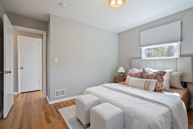5204 N Maple St, Spokane, WA 99205 - bedroom with light wood-type flooring and baseboards