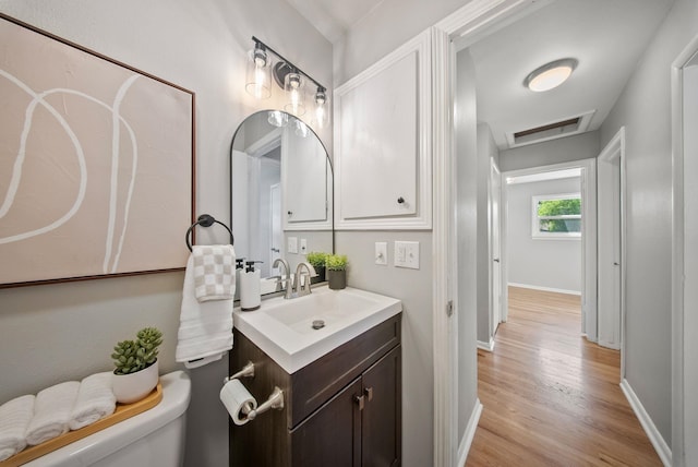 5204 N Maple St, Spokane, WA 99205 - bathroom with vanity and wood finished floors