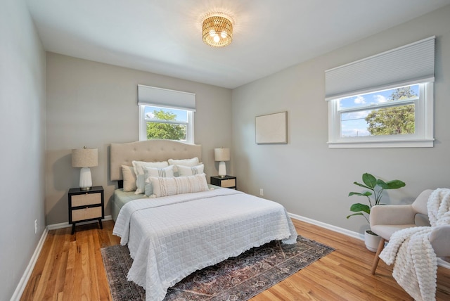 5204 N Maple St, Spokane, WA 99205 - bedroom with baseboards and wood finished floors