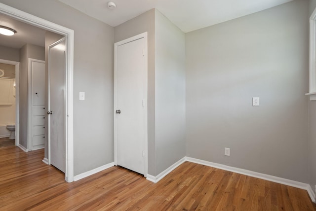 5204 N Maple St, Spokane, WA 99205 - unfurnished bedroom featuring baseboards and light wood-style floors