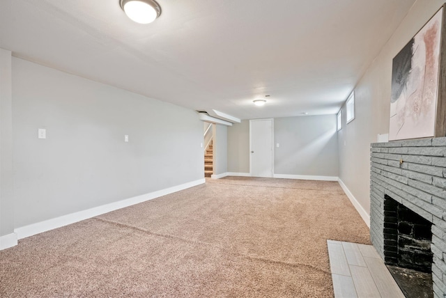 5204 N Maple St, Spokane, WA 99205 - finished below grade area featuring carpet flooring, a fireplace, and stairs