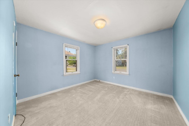3829 W Broad Ave, Spokane, WA 99205 - carpeted spare room with baseboards