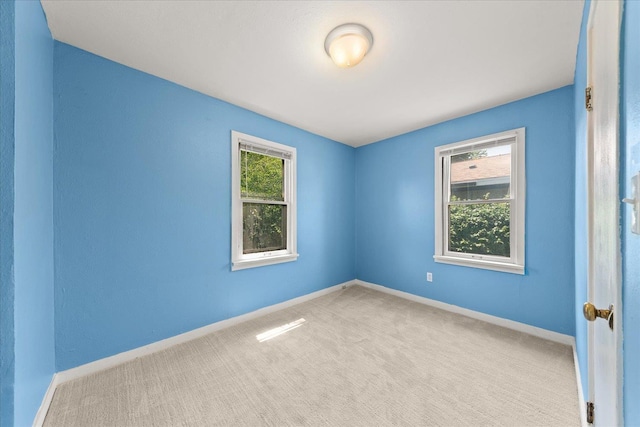 3829 W Broad Ave, Spokane, WA 99205 - carpeted spare room with baseboards