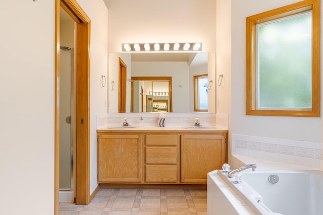 2106 E Turnberry Ln, Spokane, WA 99223 - bathroom with a bath and double vanity