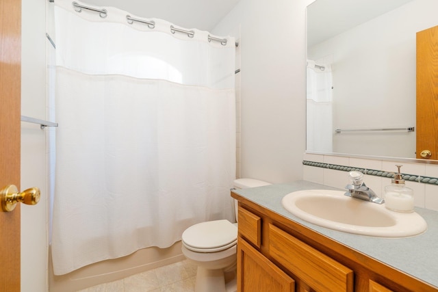 2106 E Turnberry Ln, Spokane, WA 99223 - bathroom with vanity, decorative backsplash, shower / bath combo with shower curtain, and tile patterned floors