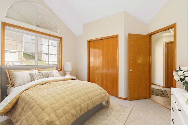 2106 E Turnberry Ln, Spokane, WA 99223 - bedroom featuring vaulted ceiling, a closet, and light carpet