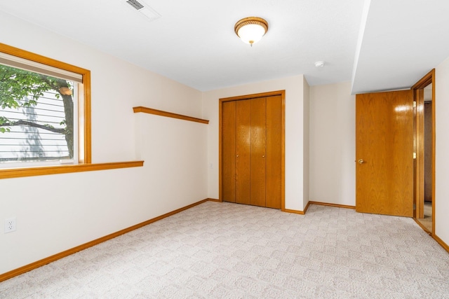2106 E Turnberry Ln, Spokane, WA 99223 - unfurnished bedroom featuring a closet and carpet floors