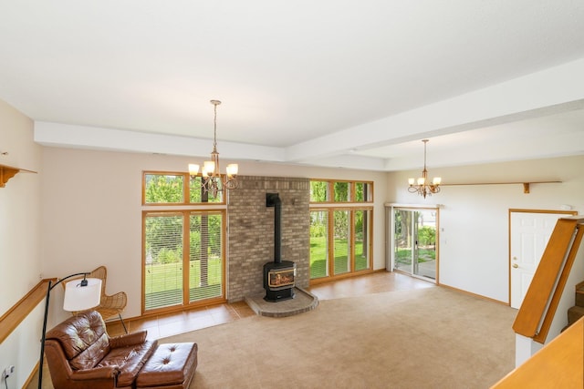 2106 E Turnberry Ln, Spokane, WA 99223 - living area featuring a chandelier, a wood stove, stairway, beamed ceiling, and light tile patterned floors