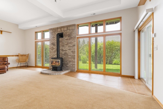 2106 E Turnberry Ln, Spokane, WA 99223 - tiled living room with a wood stove, carpet, and beam ceiling