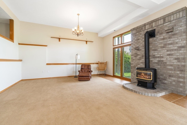 2106 E Turnberry Ln, Spokane, WA 99223 - unfurnished room with carpet floors, a wood stove, and a chandelier