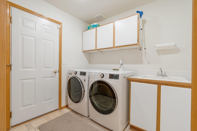 2106 E Turnberry Ln, Spokane, WA 99223 - washroom featuring cabinet space, independent washer and dryer, and wet bar