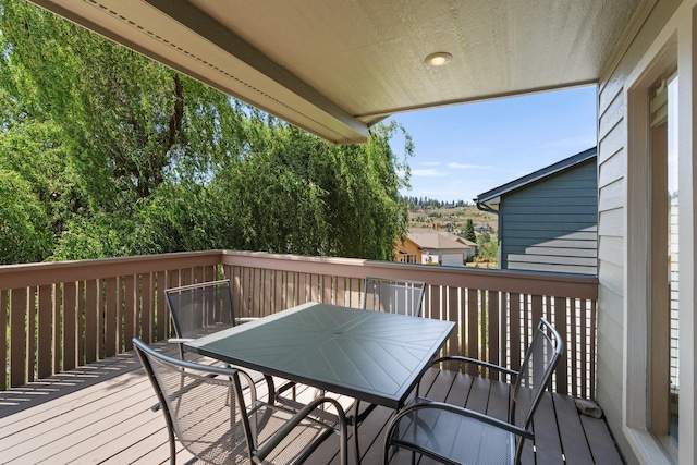 2106 E Turnberry Ln, Spokane, WA 99223 - wooden deck featuring outdoor dining area
