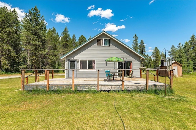 1481 Northshore Diamond Lake Rd, Newport, WA 99156 - rear view of property featuring a deck, a yard, and a shed