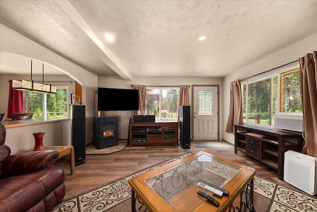 1481 Northshore Diamond Lake Rd, Newport, WA 99156 - living area with a wood stove, a textured ceiling, wood finished floors, and recessed lighting
