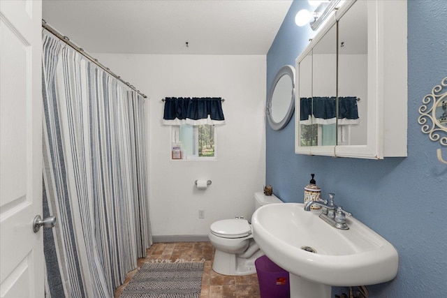 1481 Northshore Diamond Lake Rd, Newport, WA 99156 - full bath with stone finish flooring and a shower with curtain