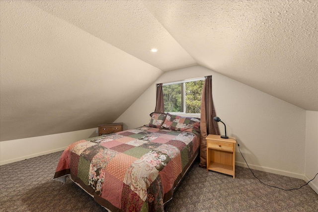 1481 Northshore Diamond Lake Rd, Newport, WA 99156 - bedroom featuring a textured ceiling, lofted ceiling, and carpet
