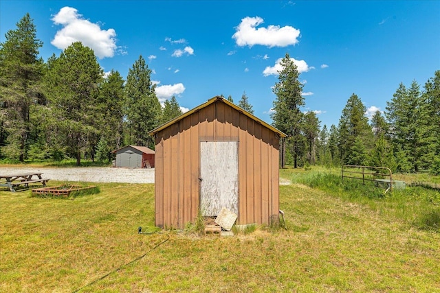 1481 Northshore Diamond Lake Rd, Newport, WA 99156 - view of shed with a view of trees