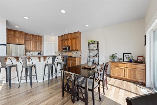 4213 S Cook St, Spokane, WA 99223 - dining space featuring light wood-type flooring and recessed lighting