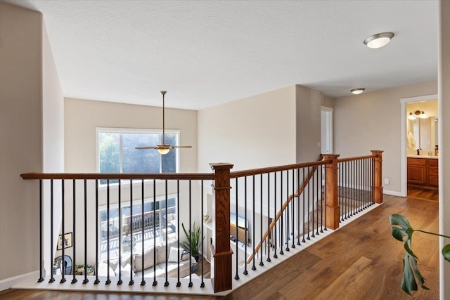 4213 S Cook St, Spokane, WA 99223 - hall with wood finished floors and an upstairs landing