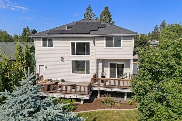 4213 S Cook St, Spokane, WA 99223 - back of property featuring solar panels, a deck, and roof with shingles
