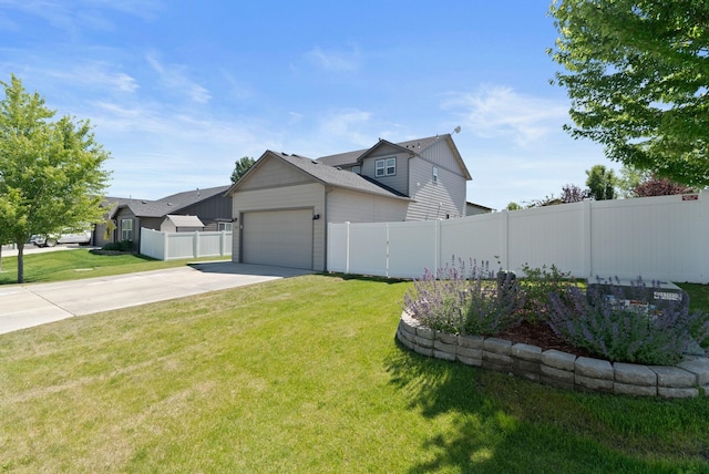 1248 W Staples Rd, Post Falls, ID 83854 - view of side of property featuring a garage and concrete driveway
