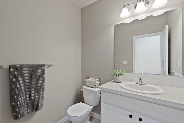 1248 W Staples Rd, Post Falls, ID 83854 - half bathroom with toilet and vanity