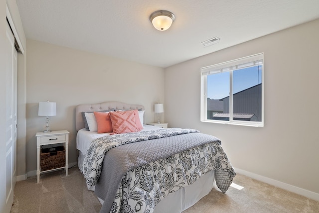 1248 W Staples Rd, Post Falls, ID 83854 - carpeted bedroom featuring baseboards and a closet