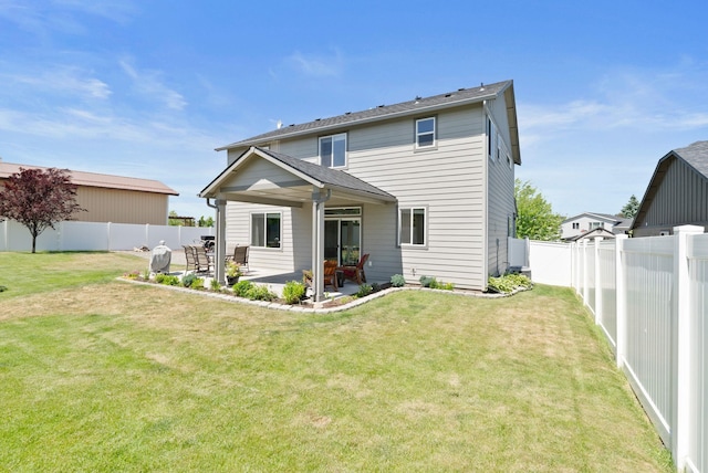 1248 W Staples Rd, Post Falls, ID 83854 - rear view of property with a patio area and a fenced backyard
