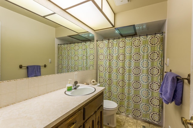 5711 N Ash St, Spokane, WA 99205 - full bath with vanity, backsplash, and curtained shower